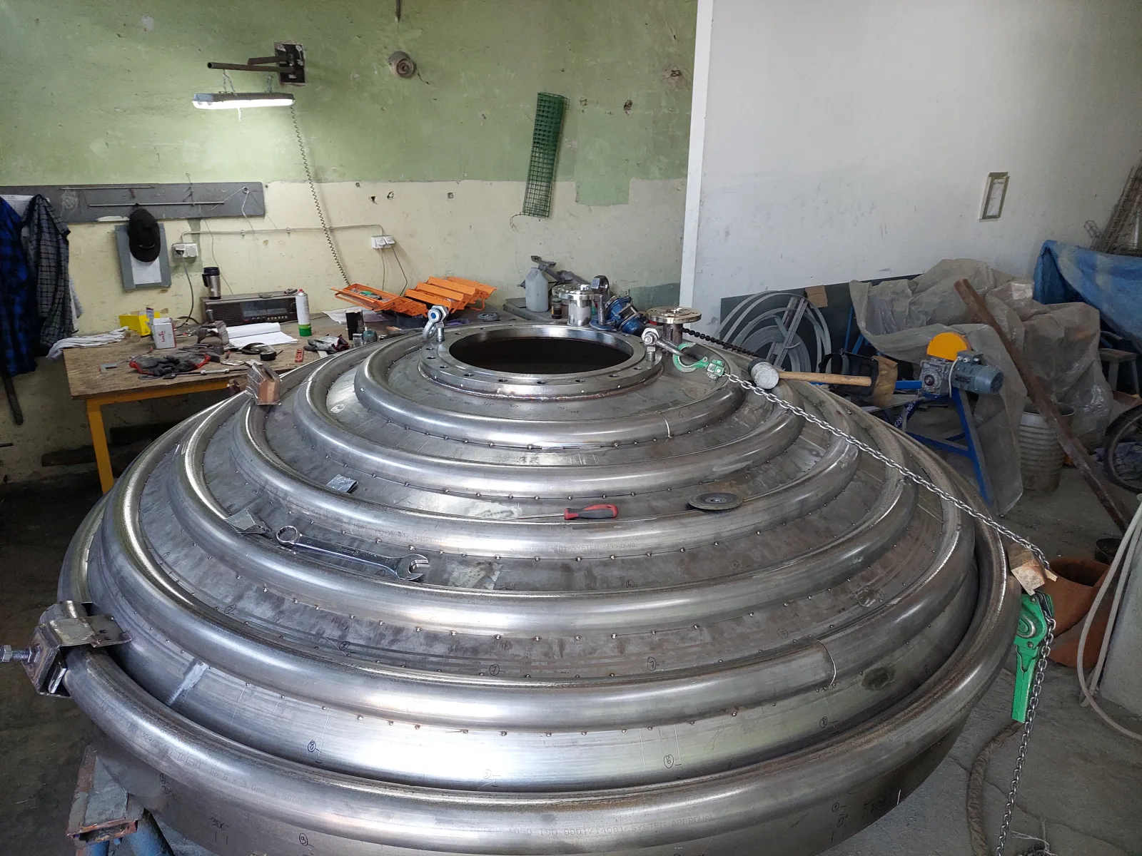 Vessel with a conical bottom during workshop works